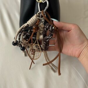 Songmont Black and Brown Accessory Charm